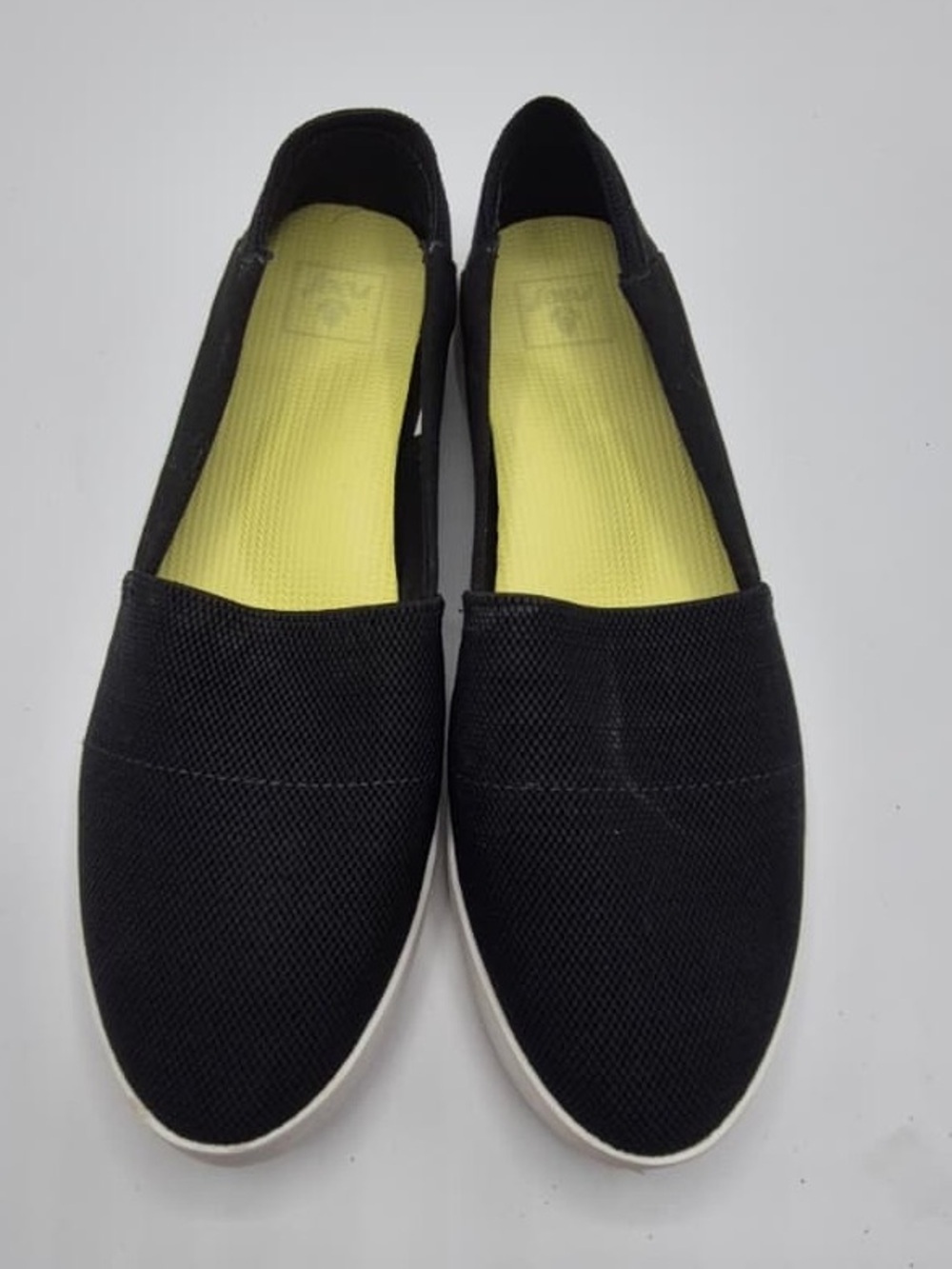 Reef Women's Black Slip-On Flats with Yellow Insole